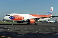 G-SUEW @ EGMC - Aircraft in My Travel livery taxies onto stand - by Alan Pratt