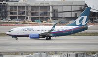 N329AT @ KLAX - Arriving at LAX - by Todd Royer