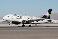 XA-VOP @ LAS - Volaris Fernando XA-VOP (FLT VOI960) with the breast cancer awareness scheme landing RWY 25L from Don Miguel Hidalgo y Costilla Int'l (MMGL/GDL) - Guadalajara, Mexico.