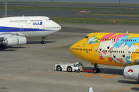 JA8957 @ RJTT - B747s face-to-face - by Micha Lueck
