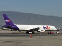 N928FD @ ONT - Parked on the side waiting to be loaded - by Helicopterfriend
