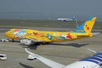 JA8957 @ RJTT - Pokemon - by Micha Lueck