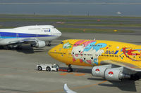 JA8957 @ RJTT - Pokemon vs. Regular - by Micha Lueck