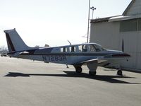 N7283R @ CNO - Parked at a hanger waiting to be worked on - by Helicopterfriend