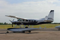 N984J @ EGMC - Parked on the main apron - by Alan Pratt