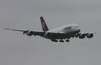 D-AIME @ MIA - Lufthansa A380 landing on runway 9 in heavy rain