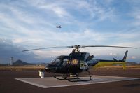 N215TV @ DVT - Resting on the west helipad - by Jarrett