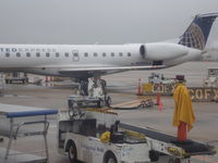 N13964 @ IAH - erj-145 - by christian maurer