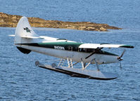 N409PA @ 5KE - Landing in the harbour of Kitchikan - by Willem Goebel