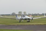 G-OCCX @ EGTC - Parked on the grass - by Alex Butler-Bates