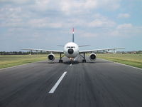 G-HLAA @ EGMC - Landed RW/06. Stopped awaiting tow to hangar due to tight turn on taxiway. - by Alan Pratt