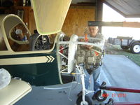 N3057K - Ken working on engine installation
