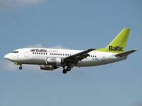 YL-BBD @ EHAM - Landing on runway C18 of Amsterdam Airport - by Willem Goebel