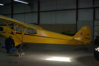 N35057 @ KCNC - In the Hangar for new brakes and some other minor repairs - by Floyd Taber