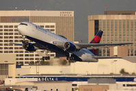 N129DL @ LAX - Delta Air Lines N129DL (FLT DAL2017) departing RWY 25R en route to Las Vegas McCarran Int'l (KLAS).  One of two special flights today to Las Vegas for the 2012 Consumer Electronics Show, which runs Jan 10-13, 2012.