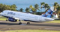 N579JB @ TNCM - N579JB