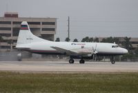 N171FL @ MIA - IFL Convair 580 - by Florida Metal