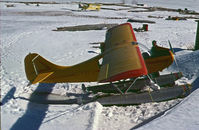 C-FNKG - Seen in Dryden, Ontario pulled up on the shore of Wabigoon Lake on April 20, 1978. The photographer and Paul Boles were investigating its possible purchase for the Sioux Lookout Flying Club. - by Stephen B. Nicholson