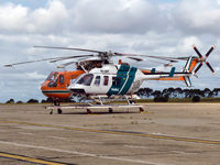 VH-BHF @ YMEN - VH-BHF on dolley in front of Sikorsky S64F N197AC, aerial firefighter  - by red750
