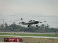 N9514J @ CNO - Lifting off from runway 26R - by Helicopterfriend
