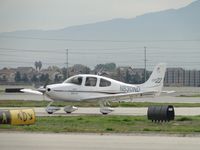 N830ND @ CNO - Waiting on taxiway Delta for permission to taxi to west parking area - by Helicopterfriend
