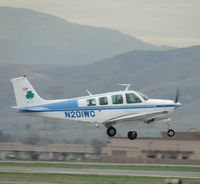 N201WC @ CNO - Lifting off from runway 26R - by Helicopterfriend