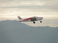 N7085R @ CNO - Lifting off from runway 26R on a hazy day - by Helicopterfriend