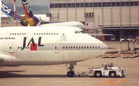 JA8086 @ NRT - Japan Airlines - JAL , official carrer Olympic Games Barcelona 1992 - by Henk Geerlings