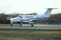 G-MEGN @ EGFH - Super King Air of Cardiff based Dragonfly Aviation Services departing on a wet Runway 22. - by Roger Winser