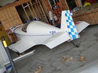 N13UG @ CNO - Wings off and resting in the hanger - by Helicopterfriend