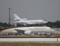 N520AF @ MIA - Falcon 50 - by Florida Metal
