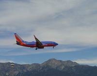 N288WN @ ONT - On final for 8L on a very windy day - by Helicopterfriend