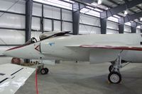 141853 - Grumman F11F-1 Tiger, converted to flying testbed for experiments with an in-flight thrust reverser in 1974-1975, at the Pueblo Weisbrod Aircraft Museum, Pueblo CO