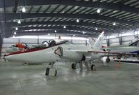 141853 - Grumman F11F-1 Tiger, converted to flying testbed for experiments with an in-flight thrust reverser in 1974-1975, at the Pueblo Weisbrod Aircraft Museum, Pueblo CO