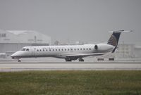 N13133 @ MIA - United E145XR - by Florida Metal