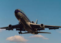 N338EA @ KMIA - On Finals - by Kenny Ganz