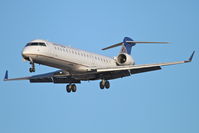 N513MJ @ KORD - Mesa Airlines/United Express Bombardier CL-600-2C10, ASH3760 arriving from KMCI RWY 28 approach KORD. - by Mark Kalfas