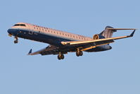 N162GJ @ KORD - GoJet/United Express Bombardier CL-600-2C10, GJS3620 arriving from New Orleans - KMSY, RWY 28 approach KORD. - by Mark Kalfas