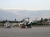 N2086N @ OXR - 1994 Schweizer 269D, one Allison 250-C20W Turboshaft 235 shp for takeoff, 220 shp max continuous operation, servicing on ramp - by Doug Robertson