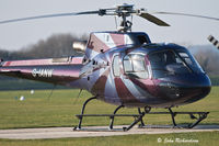 G-IANW @ EGHR - On the Heli pad at Goodwood - by John Richardson