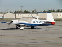 N990JD @ FUL - Tied down, parked, and covered - by Helicopterfriend