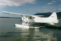 VH-IMU - Photograph by Edwin van Opstal with permission. Scanned from a color print. Photo taken at Cairns  Seaplane base. - by red750