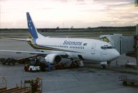 VH-TJB - Photograph by Edwin van Opstal with permission. Scanned from a color print. Leased to Solomons Airlines. but used on Qantas routes when not required by Solomons. Taken at dusk - runway lights on. - by red750