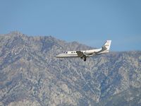 N16TS @ ONT - Approaching the outer fence line on final to runway 26R - by Helicopterfriend