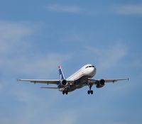 N624AW @ ONT - US Airways flt 647 arriving from Phoenix, Az, on final to runway 8L. - by Helicopterfriend