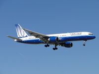 N533UA @ ONT - On final to runway 8L, passing the outer fence. - by Helicopterfriend