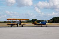 N46389 @ GIF - Stearman Model 75 and 1943 Fairchild M-62A-3 (PT-19B) N46389 at Gilbert Airport, Winter Haven, FL - by scotch-canadian