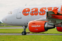 G-EZFO @ EGGP - On hold on taxiway A1 awaiting clearance onto runway 27 for departure. - by Mark J Kopczewski