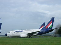 HA-LOE @ EINN - HA LOE parked next to aer lingus hgr 10-02-2012