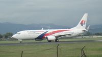 9M-MXA @ WBKK - Takeoff via Runway 02 - by Amer94